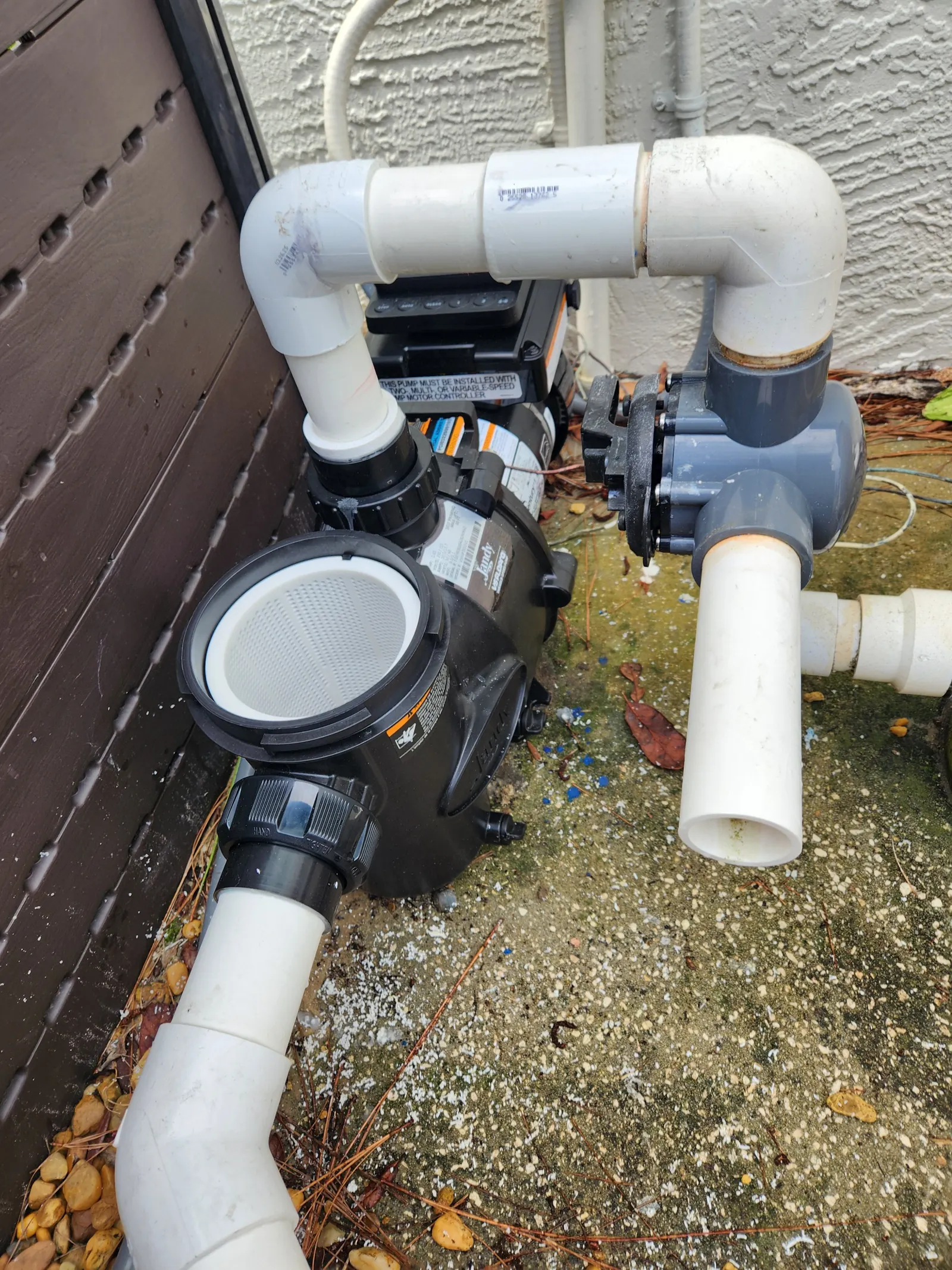 Pool pump and valve plumbing at a Weeki Wachee-area home